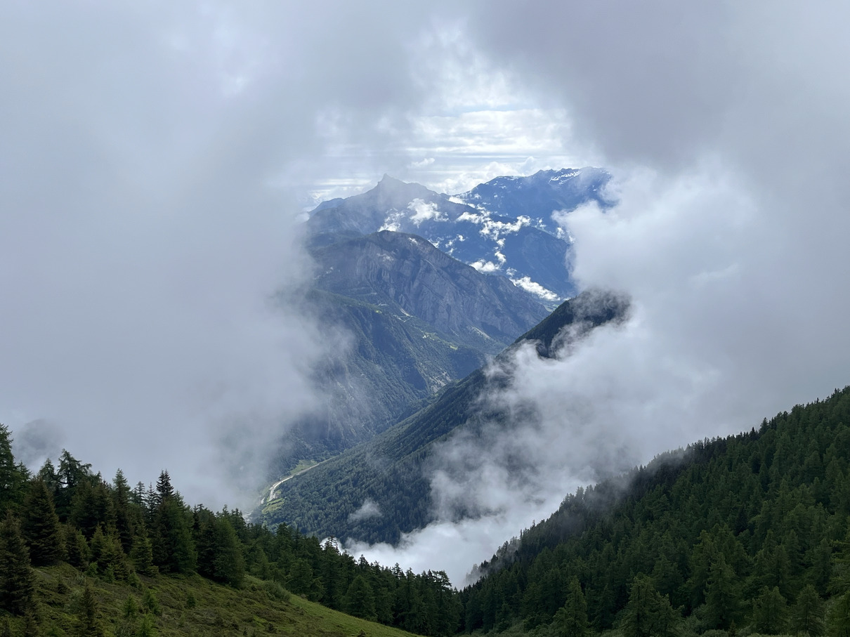 Clouds framing mountains